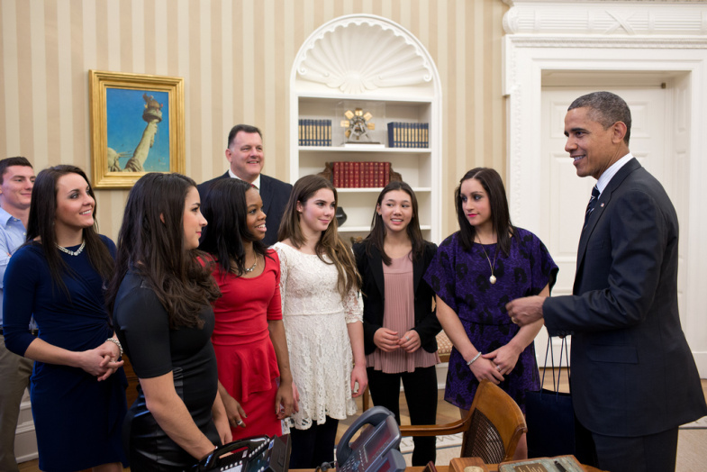 President Obama talks with members of the 2012 U.S. Olympic gymnastics teams in the Oval Office, Nov. 15.